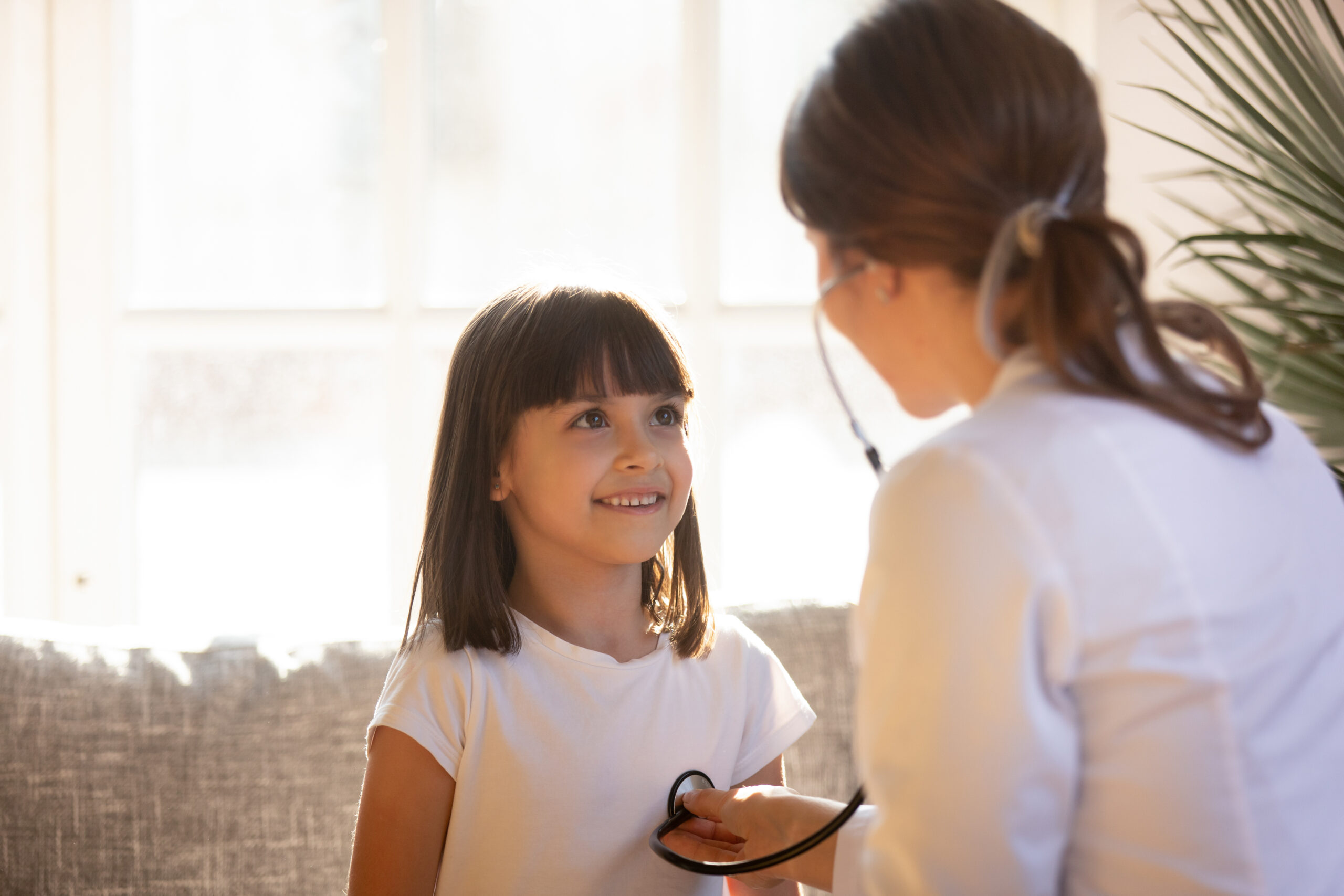 Cute,Kid,Patient,Visiting,Female,Doctor,Pediatrician,Nurse,Holding,Stethoscope