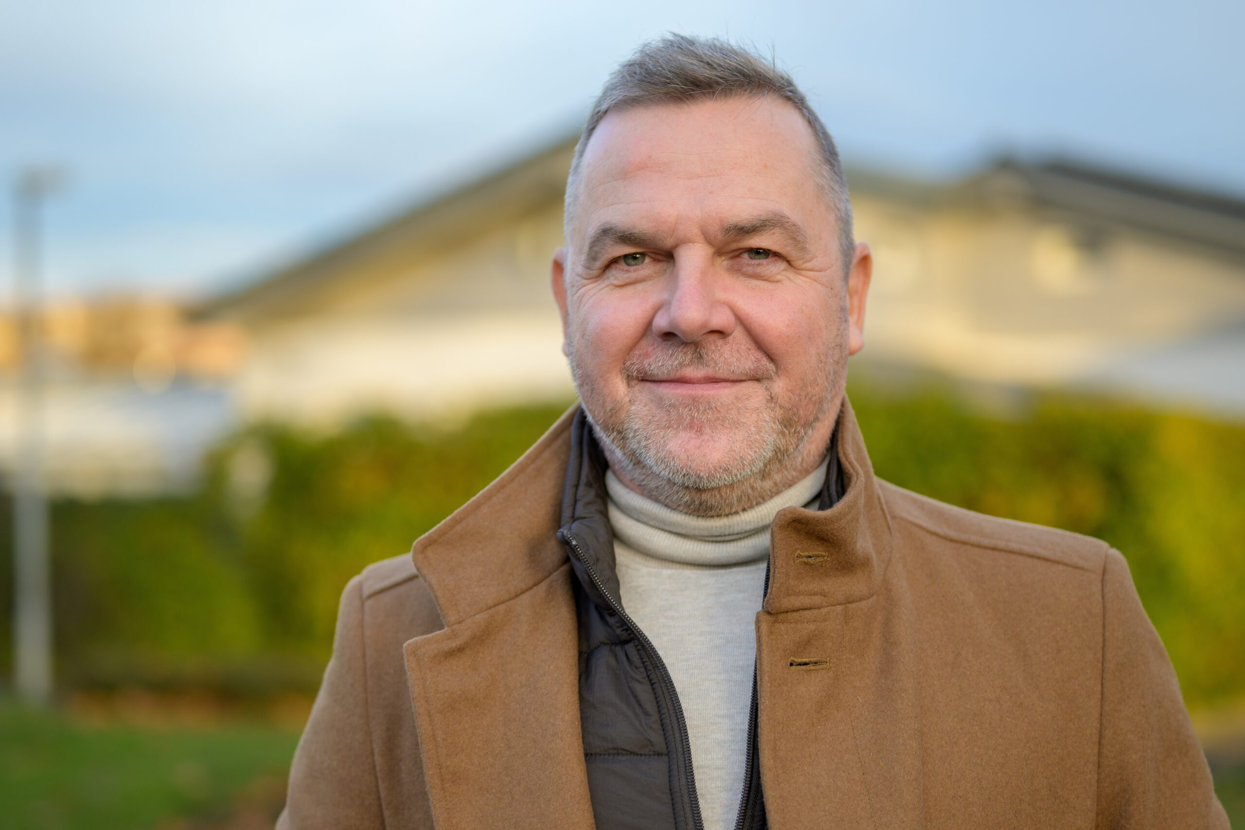 Portrait,Of,A,Middle,Aged,Man,In,A,Brown,Coat